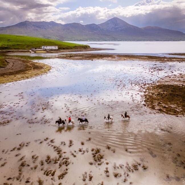 Horseback riding the Wild Atlantic Way; County Mayo, Ireland